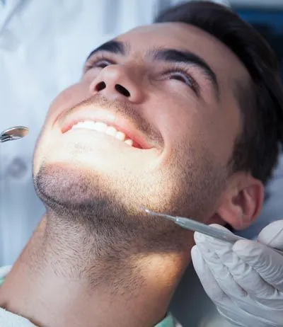 closeup receiving dental care at Moritis & Shin Dentistry in Seattle, WA