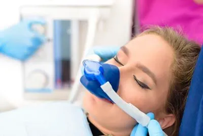 patient asleep during her dental procedure thanks to Moritis & Shin Dentistry sedation dentistry