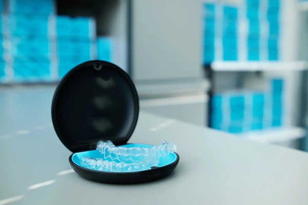 Invisalign clear aligners laying on a table